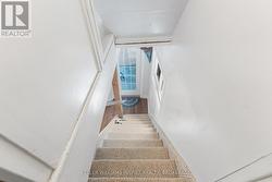 Back staircase into the kitchen for early mornings - 