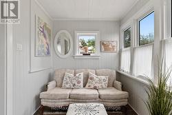 Sunroom walks out to deck and backyard - 