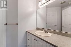Second bathroom accessed from hall - 