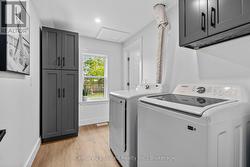 MAIN FLOOR LAUNDRY AND STORAGE - 