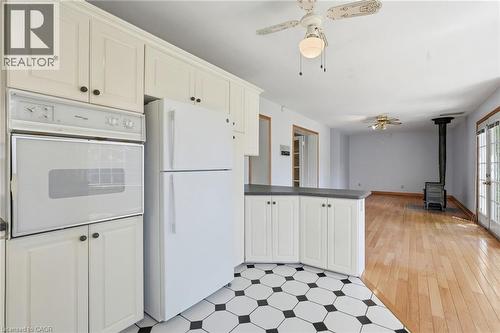 Kitchen featuring white cabinetry, built-in oven, and a built-in refrigerator - 3 Ancaster Street E, Dundas, ON - Indoor