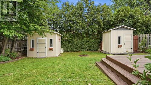 private yard with deck and sheds - 61 San Pedro Drive, Hamilton, ON 
