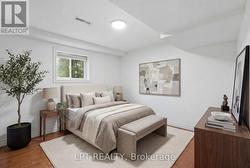 Virtually staged basement bedroom 1 - 