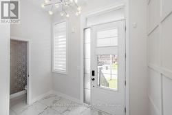 Bright Entry with Statement Chandelier - 