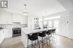 Custom Kitchen with 2 Pantries - 