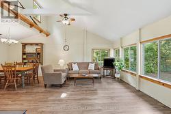 TWO LIVING AREAS WITH WOODSTOVE - 