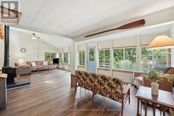 TWO LARGE LIVING AREAS WITH A VIEW OF THE RIVER - 