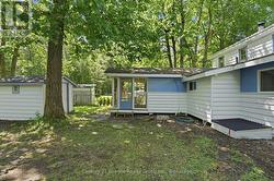 SCREEN PORCH ENTRANCE AND STORAGE SHED - 
