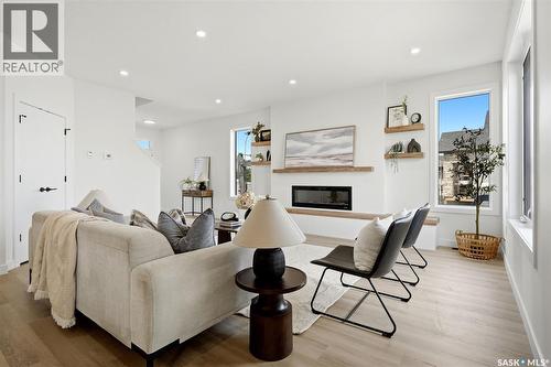 55 Country Road, Lumsden, SK - Indoor Photo Showing Living Room With Fireplace