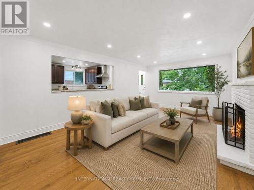 Family/living room - Virtually Staged - 1213 Erindale Drive, Ottawa, ON 