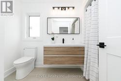 Gorgeous floating vanity in main upper bath - 