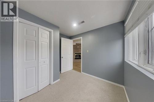 Carpeted interior space with a recessed light fixture - 233 Benesfort Crescent, Kitchener, ON 