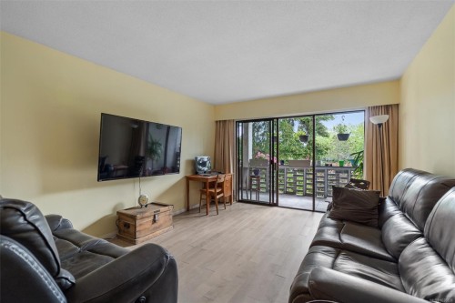 #205-2040 White Birch Rd, Sidney, BC - Indoor Photo Showing Living Room