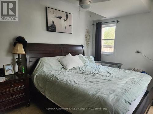Primary Bedroom Two Bedroom Lower Main Building - 3232 Simcoe Road, Ramara, ON 