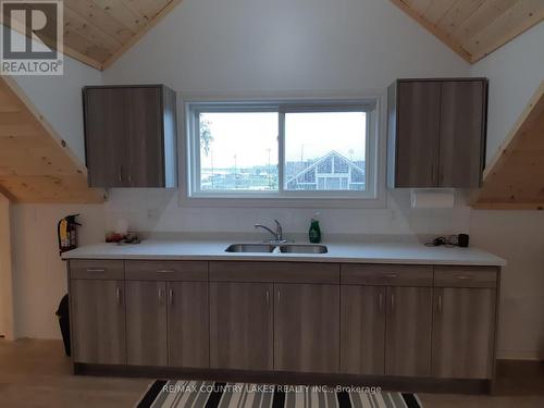 Kitchen in the 2 bedroom over garage - 3232 Simcoe Road, Ramara, ON 