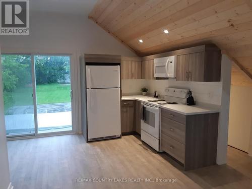 Kitchen in the 2 bedroom over garage - 3232 Simcoe Road, Ramara, ON 