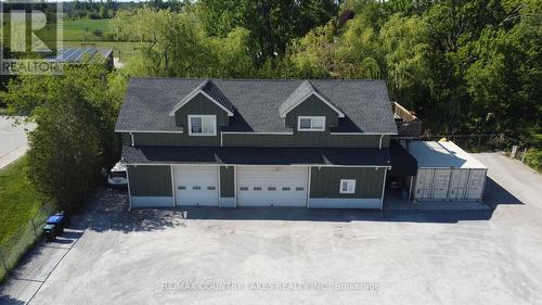 Commercial Garage with Upper 2 Bedroom Apt - 3232 Simcoe Road, Ramara, ON 