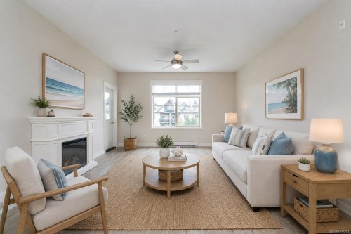 302-1900 Tulsa Rd, Nanaimo, BC - Indoor Photo Showing Living Room With Fireplace