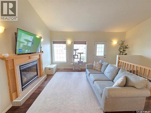 12 Arcola Place, Carlyle, SK - Indoor Photo Showing Living Room With Fireplace