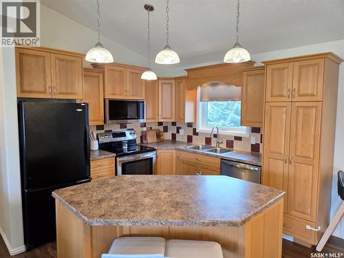 12 Arcola Place, Carlyle, SK - Indoor Photo Showing Kitchen With Double Sink