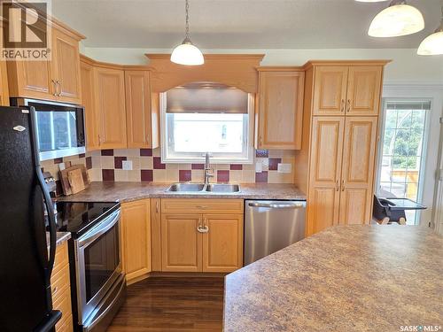 12 Arcola Place, Carlyle, SK - Indoor Photo Showing Kitchen With Double Sink