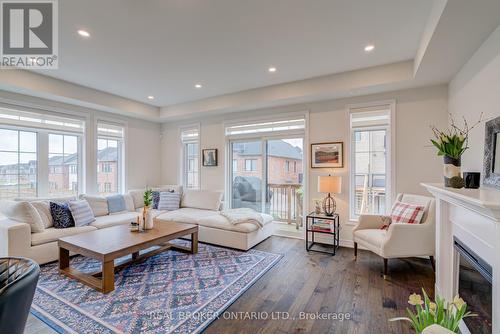 12 Icemaker Way, Whitby, ON - Indoor Photo Showing Living Room With Fireplace