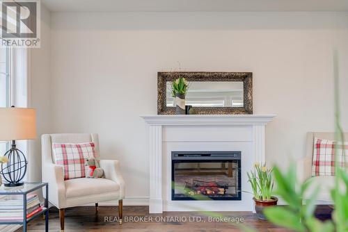 12 Icemaker Way, Whitby, ON - Indoor Photo Showing Living Room With Fireplace