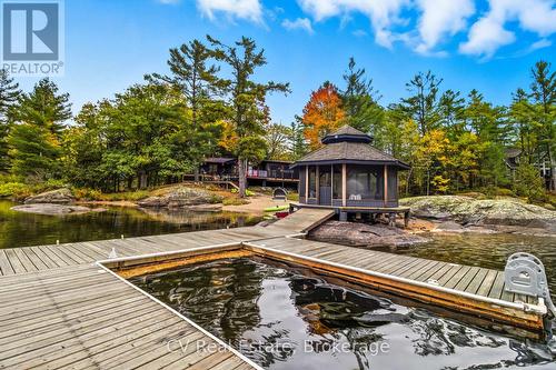 1069 White Eagle Road, Gravenhurst (Morrison), ON - Outdoor With Body Of Water With Deck Patio Veranda