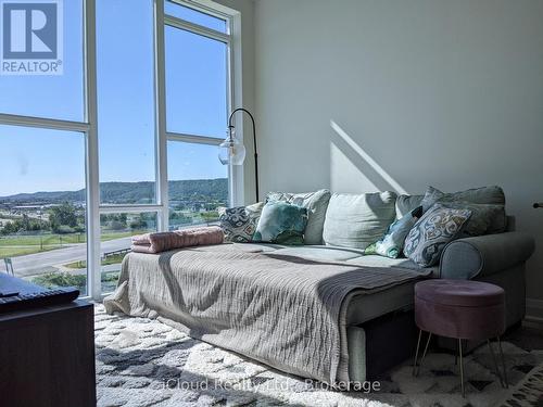 Living Area with Floor-to-Ceiling Windows - 617 - 16 Concord Place, Grimsby, ON - Indoor Photo Showing Bedroom