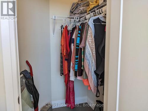 Primary Bedroom Walk-In Closet - 617 - 16 Concord Place, Grimsby, ON - Indoor With Storage