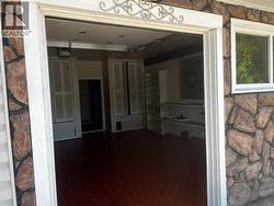 small garage door going into working / garage area - 