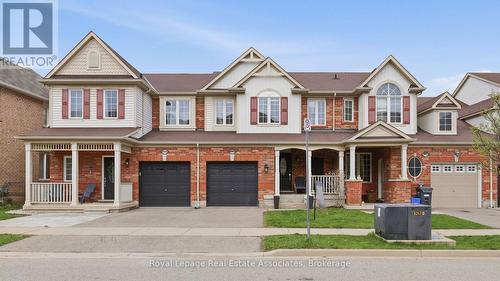 Two-storey Town - 362 Cavanagh Lane, Milton, ON - Outdoor With Facade