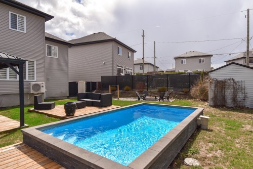 Piscine - 717 Rue De Chenonceau, Saint-Jérôme, QC - Outdoor With Above Ground Pool With Deck Patio Veranda With Backyard With Exterior