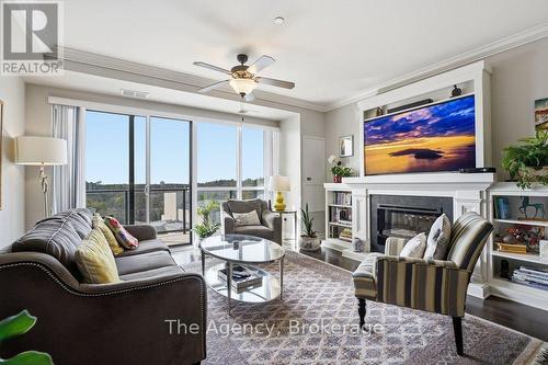 901 - 160 Macdonell Street, Guelph (Downtown), ON - Indoor Photo Showing Living Room With Fireplace