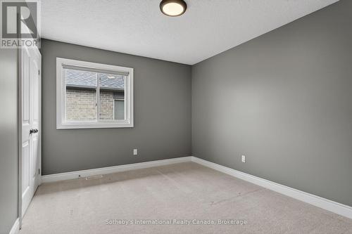 Guest Bedroom 1 - 19 Garbutt Crescent, Collingwood, ON - Indoor Photo Showing Other Room