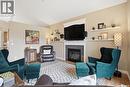 139 Pulles Crescent, Saskatoon, SK  - Indoor Photo Showing Living Room With Fireplace 