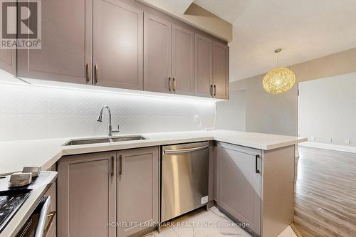 314B - 21 Upper Duke Crescent, Markham, ON - Indoor Photo Showing Kitchen With Double Sink