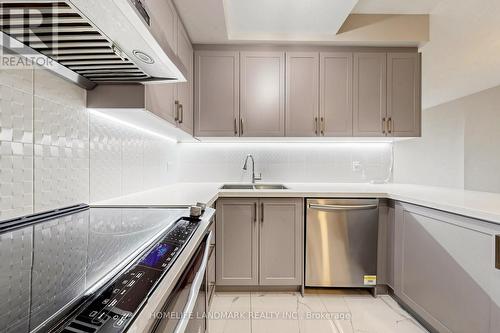 314B - 21 Upper Duke Crescent, Markham, ON - Indoor Photo Showing Kitchen With Double Sink