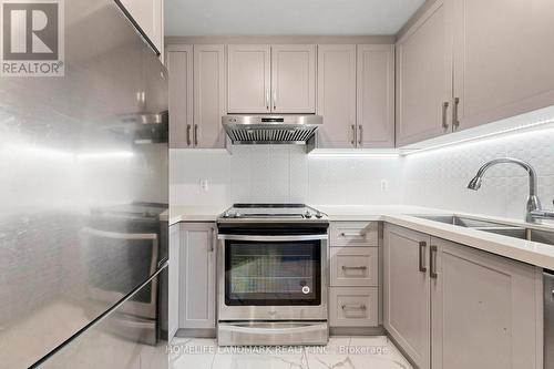 314B - 21 Upper Duke Crescent, Markham, ON - Indoor Photo Showing Kitchen With Double Sink