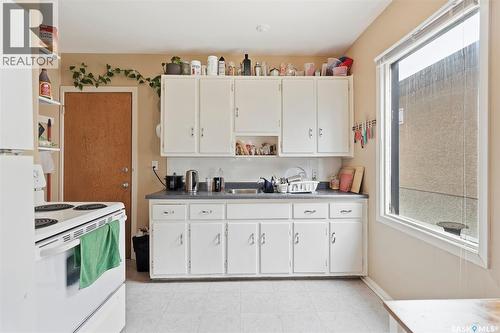 1117 15Th Street E, Saskatoon, SK - Indoor Photo Showing Kitchen With Double Sink