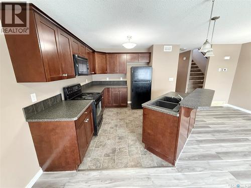 602 Barber Crescent, Weyburn, SK - Indoor Photo Showing Kitchen With Double Sink
