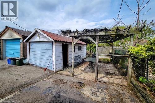 Detached garage structure with a light blue door - 463 Wellington Street N, Hamilton, ON - Outdoor
