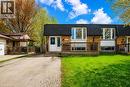 Brick exterior townhouse with a dark shingle roof - 2367 Middlesmoor Crescent, Burlington, ON  - Outdoor With Deck Patio Veranda 
