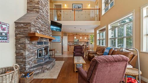 7666 Lichen Road, Anglemont, BC - Indoor Photo Showing Living Room With Fireplace