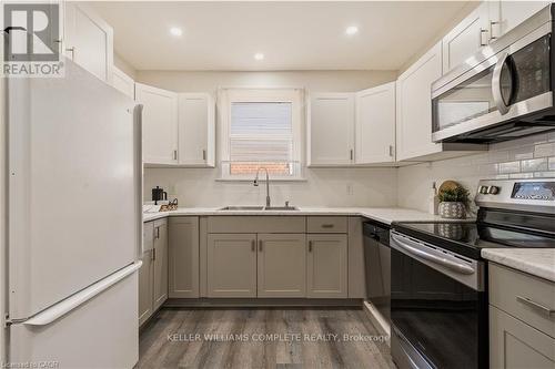 148 Huxley Avenue S, Hamilton, ON - Indoor Photo Showing Kitchen With Double Sink