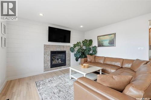 402 Crystal Bay, Warman, SK - Indoor Photo Showing Living Room With Fireplace