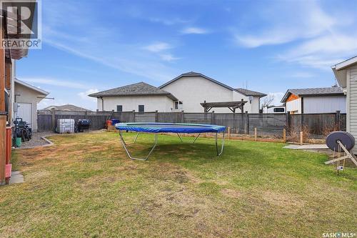 402 Crystal Bay, Warman, SK - Outdoor With Deck Patio Veranda With Backyard With Exterior