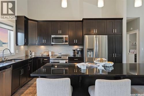 407 Silver Birch Lane, Warman, SK - Indoor Photo Showing Kitchen With Double Sink With Upgraded Kitchen