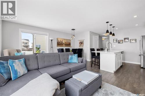 145 Plains Circle, Pilot Butte, SK - Indoor Photo Showing Living Room