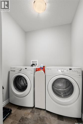 145 Plains Circle, Pilot Butte, SK - Indoor Photo Showing Laundry Room